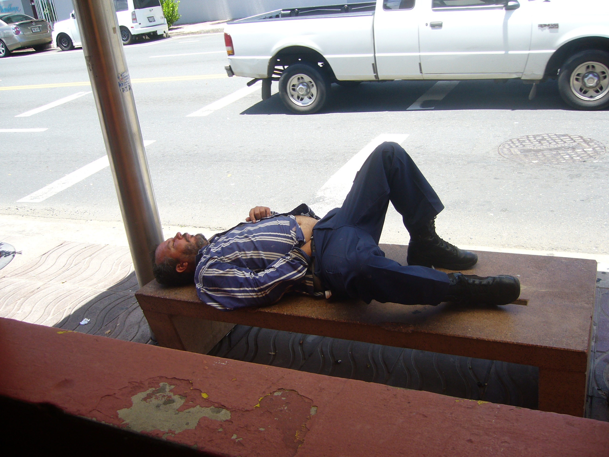 This is a bum living it up in Puerto Rico! I saw him while having lunch one day and I was both amused and saddened by the sight.
